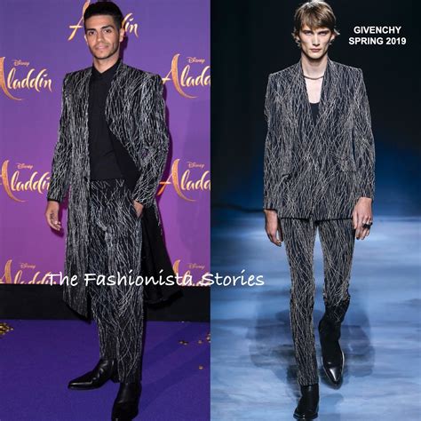 Mena Massoud in Givenchy at the 'Aladdin' Paris 